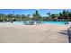 Community pool with lounge chairs and umbrellas at 346 Bradley Bend Drive, Moncks Corner, SC 29461