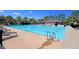 Community pool with lounge chairs and umbrellas at 346 Bradley Bend Drive, Moncks Corner, SC 29461