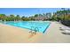 Community lap pool with lounge chairs and pool house at 346 Bradley Bend Drive, Moncks Corner, SC 29461