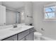 Grey bathroom vanity with white countertop and shower/tub combo at 4587 Summey St, North Charleston, SC 29405