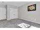 Spacious bedroom with double doors and carpeting at 4587 Summey St, North Charleston, SC 29405