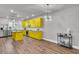 Modern kitchen with yellow cabinets and island, open concept at 4587 Summey St, North Charleston, SC 29405