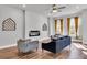 Bright living room with fireplace and hardwood floors at 4587 Summey St, North Charleston, SC 29405