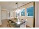 Farmhouse style dining room with wood table and neutral colored chairs at 508 Rustling Tree Ct, Summerville, SC 29486