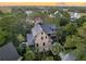 Luxury home with metal roof nestled in a tree lined community at 515 Claret Way, Kiawah Island, SC 29455
