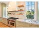 Modern kitchen with marble countertops and stainless steel appliances at 515 Claret Way, Kiawah Island, SC 29455