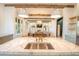 Open concept kitchen with marble island and breakfast bar at 515 Claret Way, Kiawah Island, SC 29455