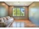 Tranquil sitting area with hardwood floors and window views at 515 Claret Way, Kiawah Island, SC 29455