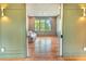 Bright sitting room with large window and hardwood floors at 515 Claret Way, Kiawah Island, SC 29455