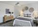 Bright bedroom with ceiling fan and unique wall decor at 519 Parkdale Dr # J, Charleston, SC 29414