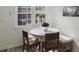 Bright breakfast nook with a round table and wicker chairs at 519 Parkdale Dr # J, Charleston, SC 29414