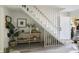 Inviting entryway with stairs, console table, and decor at 519 Parkdale Dr # J, Charleston, SC 29414