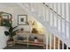 Charming entryway with staircase and decorative console table at 519 Parkdale Dr # J, Charleston, SC 29414