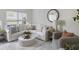 Cozy living room featuring a white sofa and accent chair at 519 Parkdale Dr # J, Charleston, SC 29414