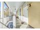 White-railed balcony overlooking a leafy street with a glimpse of the neighborhood at 53 Hasell Street St # H, Charleston, SC 29401