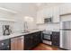 Modern kitchen featuring granite countertops and stainless steel appliances at 53 Hasell Street St # H, Charleston, SC 29401