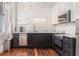 Updated kitchen with granite countertops and stainless steel appliances at 53 Hasell Street St # H, Charleston, SC 29401