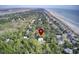 Charming home located near a long beach and fishing pier amid a beautiful wooded neighborhood at 615 W Beach Ct, Folly Beach, SC 29439