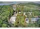 A wooded home lot enclosed in red boundary lines on a lovely coastal island at 615 W Beach Ct, Folly Beach, SC 29439