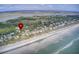 Coastal home on beachfront neighborhood with direct access to pristine sandy beach and rolling ocean waves at 615 W Beach Ct, Folly Beach, SC 29439