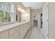 Main bathroom with double vanity and walk-in closet at 8604 Fox Hollow Rd, North Charleston, SC 29420