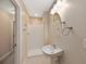 Small bathroom with a shower and pedestal sink at 8604 Fox Hollow Rd, North Charleston, SC 29420