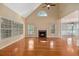 Spacious Gathering room with hardwood floors and fireplace at 8604 Fox Hollow Rd, North Charleston, SC 29420