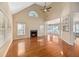 Spacious Gathering room with hardwood floors, fireplace and high ceilings at 8604 Fox Hollow Rd, North Charleston, SC 29420
