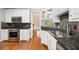 Modern kitchen with stainless steel appliances and granite countertops at 8604 Fox Hollow Rd, North Charleston, SC 29420