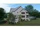 Two-story home with pool and landscaped yard at 945 Fish Camp Rd, Charleston, SC 29492