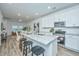 Modern kitchen with white cabinets and granite countertops at 1001 Twin Rivers Dr # 65, Wando, SC 29492