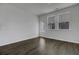 Bright bonus room with dark wood floors and access to backyard at 107 Pen Shell St, Summerville, SC 29485