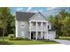 Two-story house with light green siding, balcony, and attached garage at 107 Pen Shell St, Summerville, SC 29485