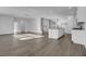 Open concept kitchen and Gathering room with island and hardwood floors at 107 Pen Shell St, Summerville, SC 29485