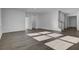 Spacious living room with hardwood floors and staircase at 107 Pen Shell St, Summerville, SC 29485