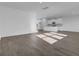 Bright living room with hardwood floors and kitchen view at 107 Pen Shell St, Summerville, SC 29485