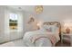 Charming bedroom with a white bed and pink accents at 110 Threaded Fern St, Summerville, SC 29485