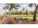 Community park with fenced dog park, picnic tables, and beautiful landscaping at 110 Threaded Fern St, Summerville, SC 29485