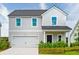 Two-story house with gray siding, white trim, and a two-car garage at 110 Threaded Fern St, Summerville, SC 29485