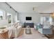 Spacious living room with light walls and comfortable seating at 110 Threaded Fern St, Summerville, SC 29485