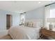 Relaxing main bedroom with a plush bed and ample natural light at 110 Threaded Fern St, Summerville, SC 29485