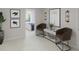 Elegant hallway with modern art and two brown leather chairs at 114 Threaded Fern St, Summerville, SC 29485