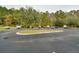 Spacious boat storage area with multiple parking spaces surrounded by trees and greenery at 1300 Park West Blvd # 1001, Mount Pleasant, SC 29466