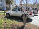 Designated accessible parking space with a sign and landscaping, providing convenient access to the community at 1300 Park West Blvd # 1001, Mount Pleasant, SC 29466