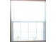 A well lit window features a white frame and white horizontal blinds at 1300 Park West Blvd # 1001, Mount Pleasant, SC 29466