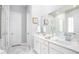 Spa-like bathroom with double vanity, large shower, and marble floors at 140 Maritime Way, Summerville, SC 29485