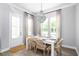 Bright dining room with white table and wicker chairs at 140 Maritime Way, Summerville, SC 29485