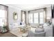 Light-filled living room with white sofa and plenty of natural light at 140 Maritime Way, Summerville, SC 29485