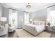 Main bedroom suite with large bed and neutral decor at 140 Maritime Way, Summerville, SC 29485