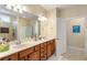 Double vanity bathroom with granite countertop at 1589 Pixley St, Charleston, SC 29414